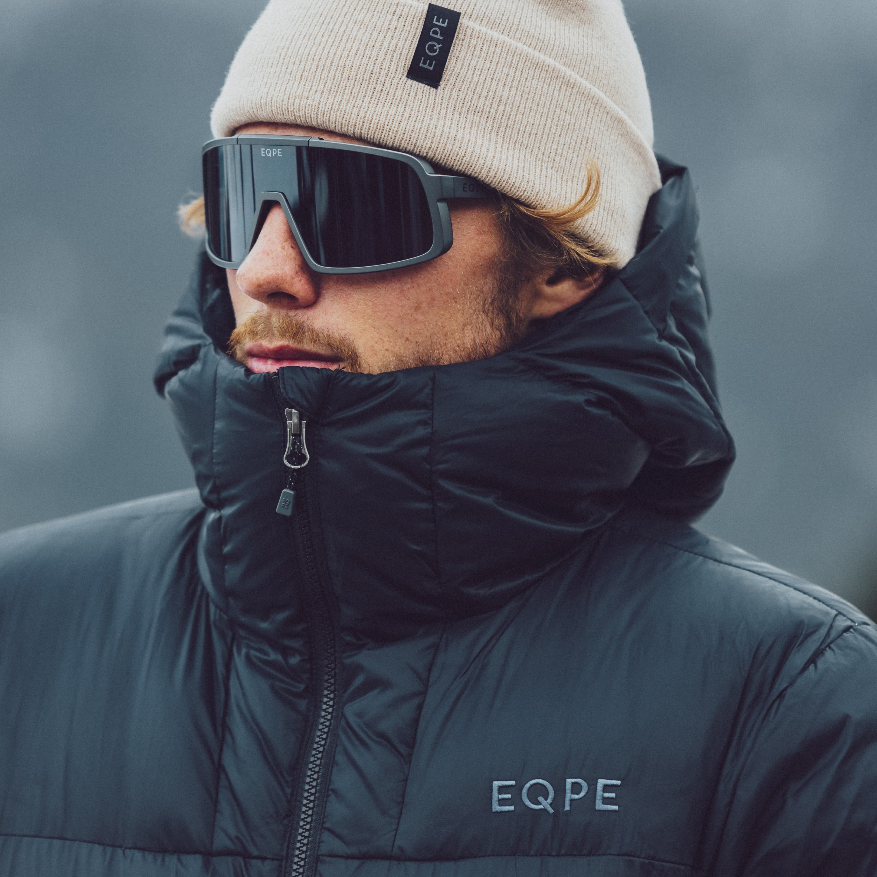 Person in black puffer jacket.