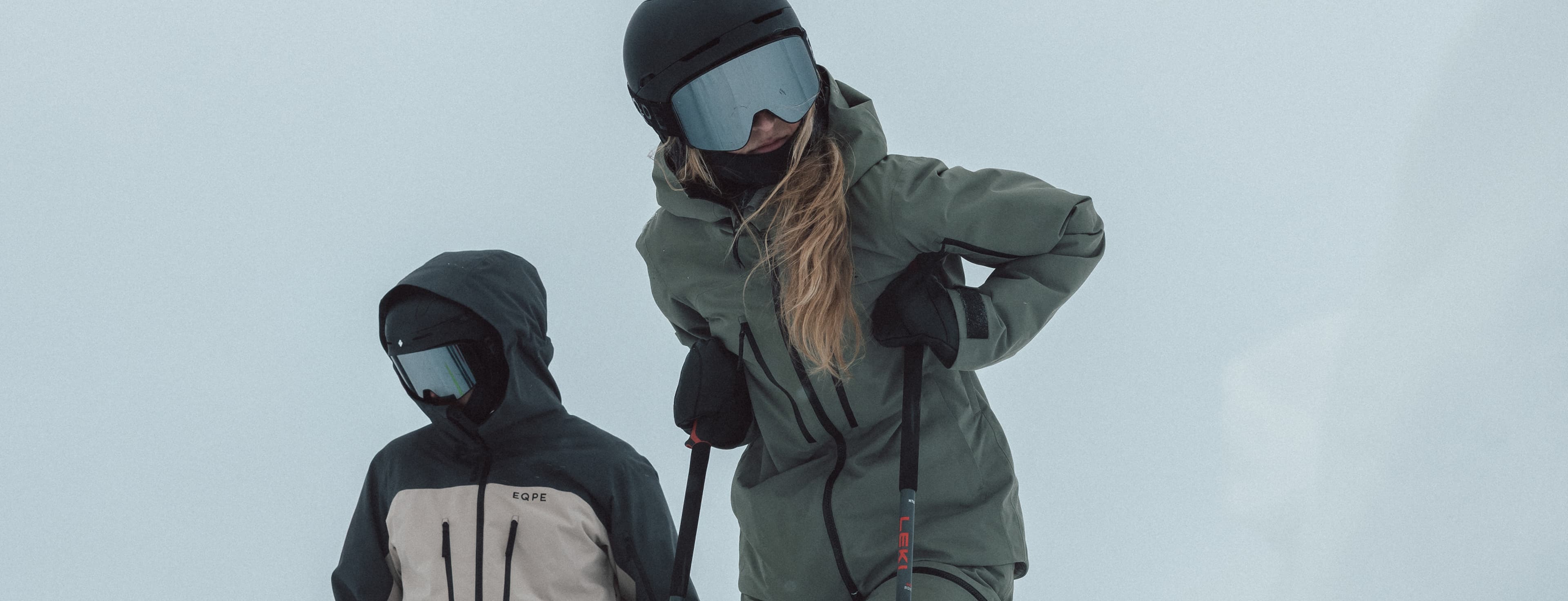 Two people in ski gear.